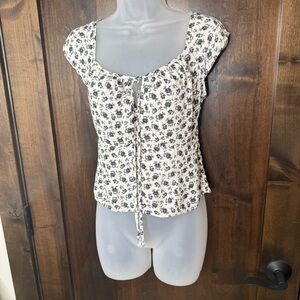 Sienna Sky Black and White Floral Blouse tie front smocked back Size L cap sleev